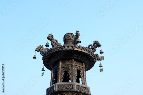 Wind chimes on incense burner