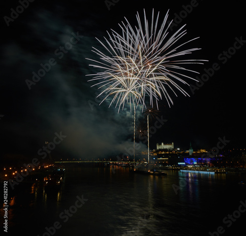 Photography Colorful Fireworks over Bratislava Castle and the Danube River at Night