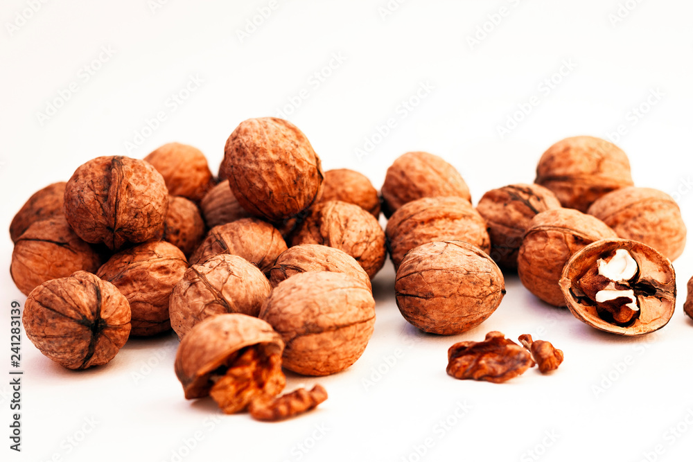 Whole walnuts kernels on white background. Whole walnuts kernels on white background.