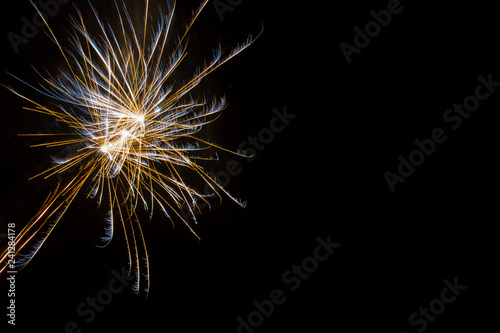 New year`s fireworks on black sky. Abstract background