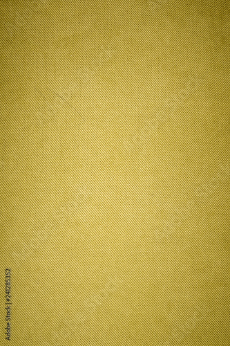 Textured background surface of textile upholstery furniture close-up. yellow Color fabric structure