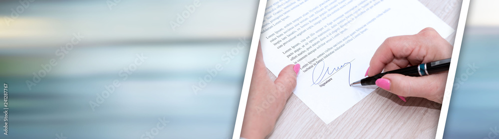 Woman signing a contract. panoramic banner Woman signing a contract. panoramic banner