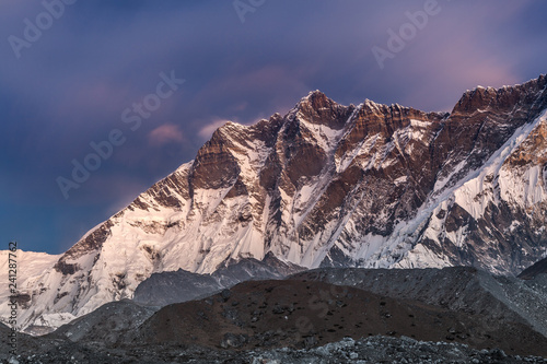 Beautiful sunset over purple Himalayan mountains on a clear day. Breathtaking photo.