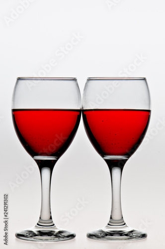 glass of red wine on white background