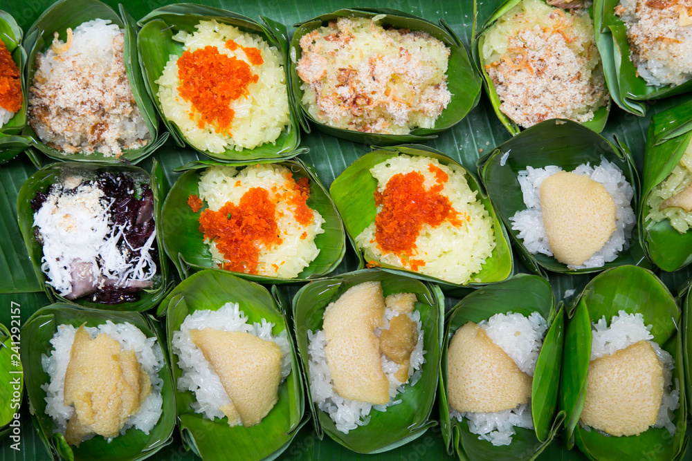 thai dessert - Sticky rice custard wrapped in banana leaves thai dessert - Sticky rice custard wrapped in banana leaves