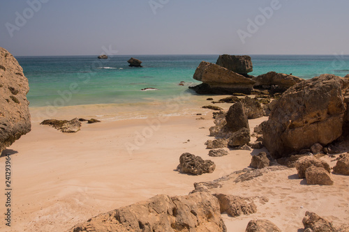 A beach with large boulders by the Arabian Sea. Oman photo