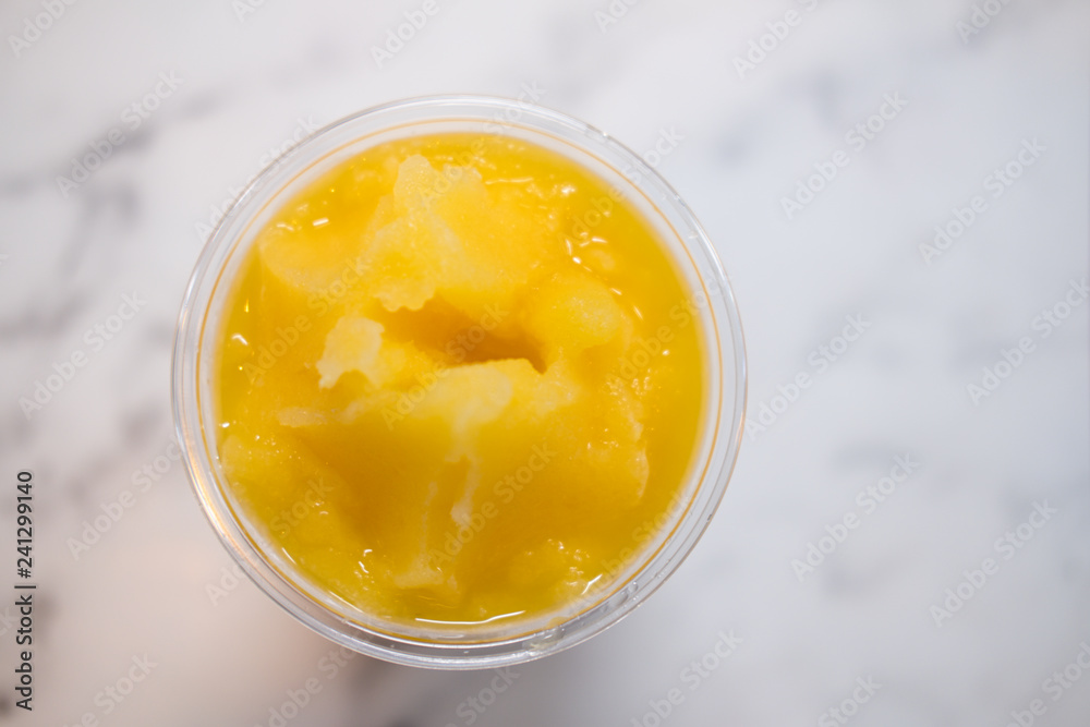 Orange fruit smoothies. Drink on a healthy summer vacation Orange fruit smoothies. Drink on a healthy summer vacation