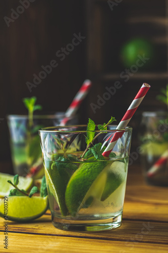 Mojito, fresh alcoholic cocktail with lime, ice and mint