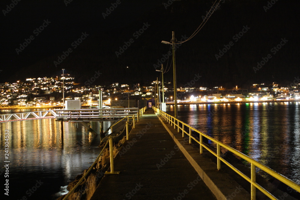 Norway, tromso- bridge in a fiord at night