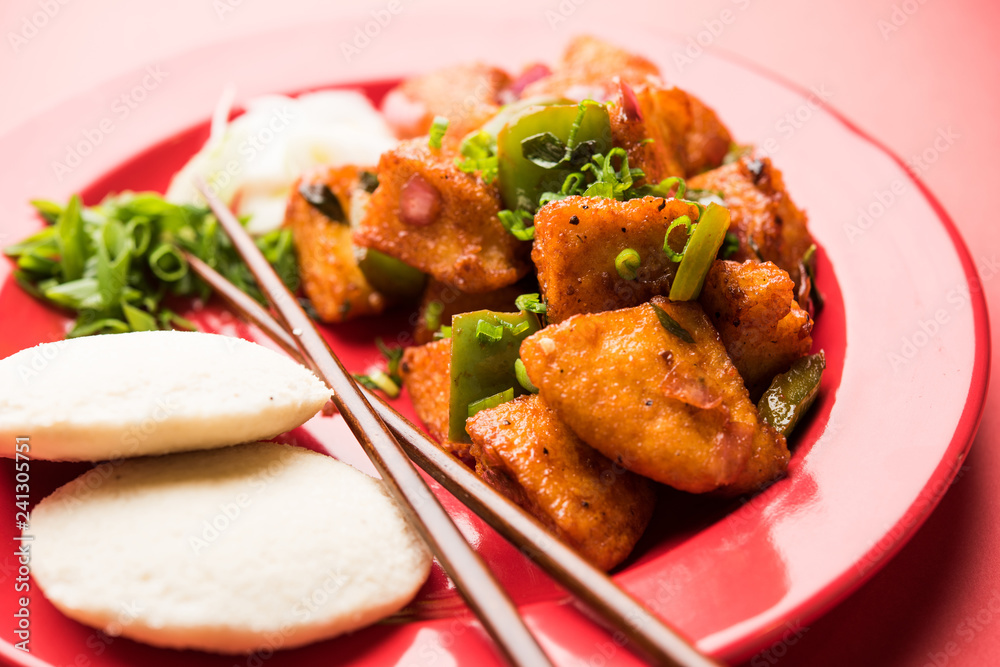 Schezwan Idli or manchurian Idly, tasty indo-chinese recipe. selective focus Schezwan Idli or manchurian Idly, tasty indo-chinese recipe. selective focus
