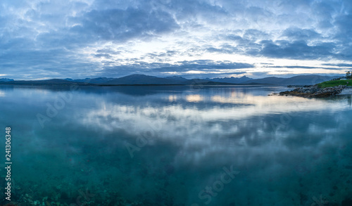 Panoramic view of the fjord from Tromso on the island of Tromsoja, Norway at dusk