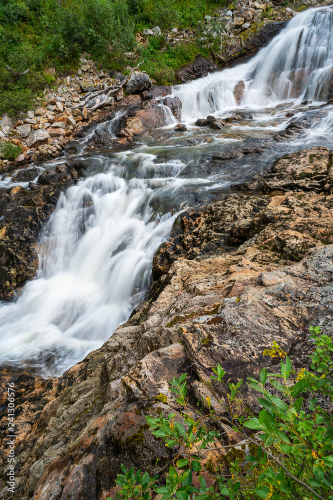 Fototapeta premium A small waterfall near Ersfjorden in Norway
