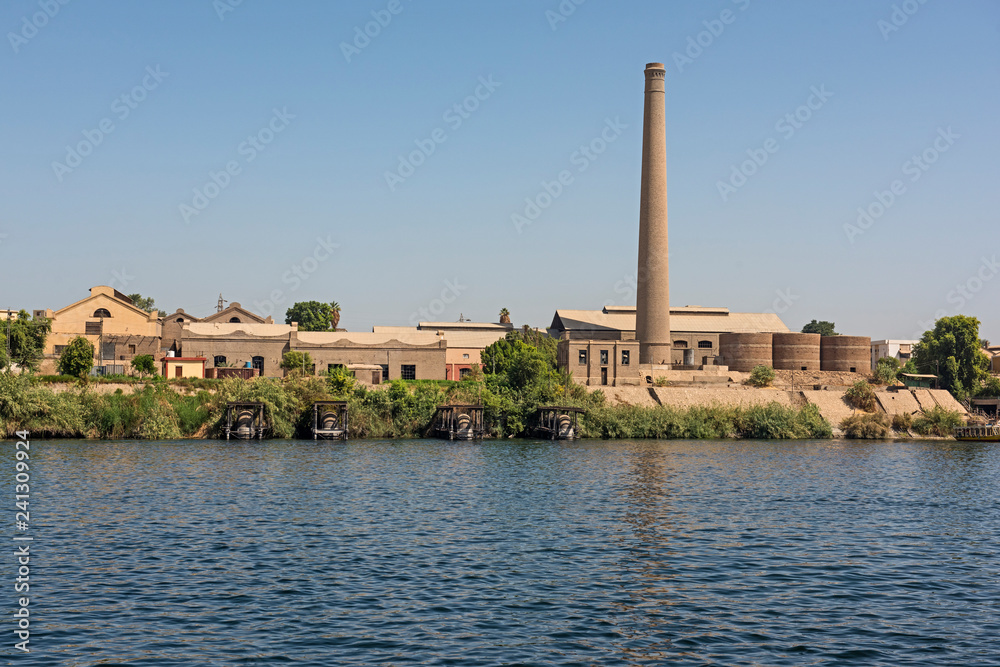Landscape view of large sugar cane factory on river nile in Egypt