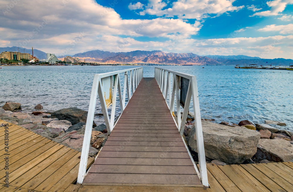 Morning view on the gulf of Aqaba from the central beach of Eilat - famous tourist resort and recreational city in Israel