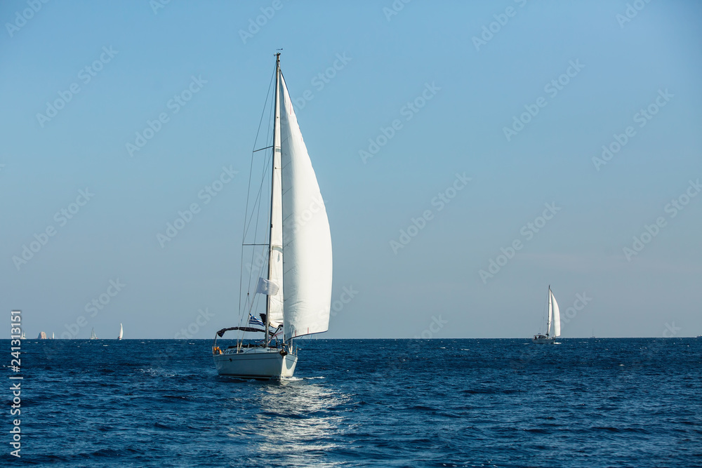 Sailing yachts regatta in Aegean sea. Luxury vacation.