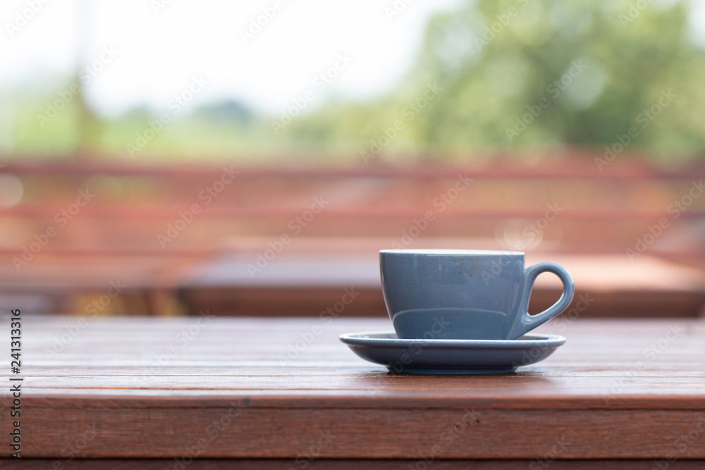 Cup of coffee on a wooden table Cup of coffee on a wooden table