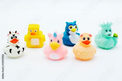 A group of rubber ducks on an isolated background