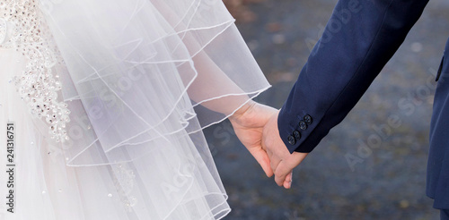 hands of the bride and groom