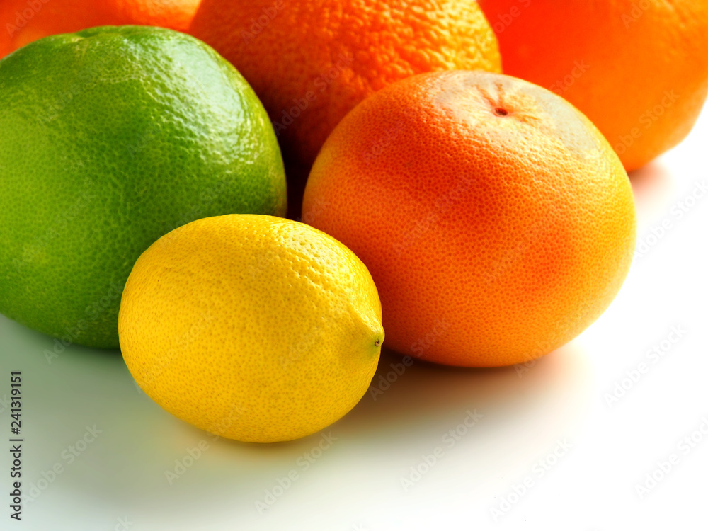 Lemon, grapefruit, oranges on a white background Lemon, grapefruit, oranges on a white background