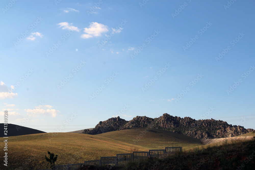 landscape with mountains and blue sky