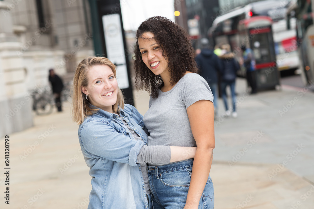 young lesbian couple posing for a portrait