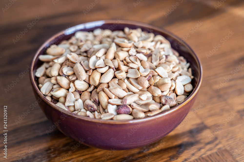 Nigerian Roasted Groundnuts Peanuts on display in bowl Nigerian Roasted Groundnuts Peanuts on display in bowl