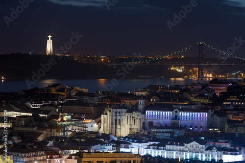 Lisbon aerial panorama view of city centre with illuminated buildings at night