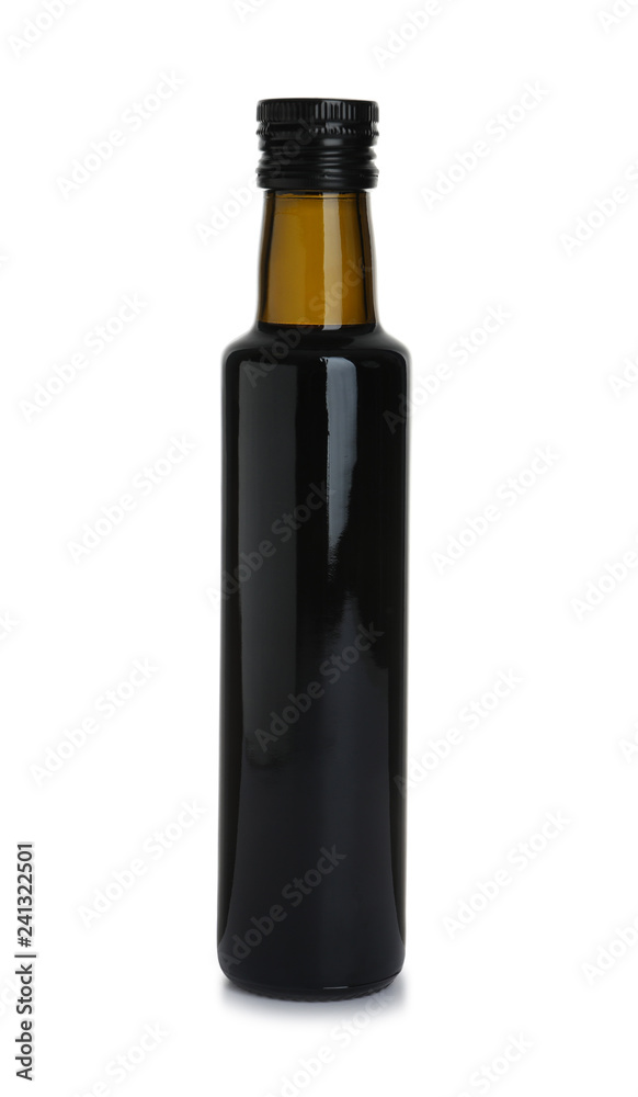 Bottle with balsamic vinegar on white background Bottle with balsamic vinegar on white background