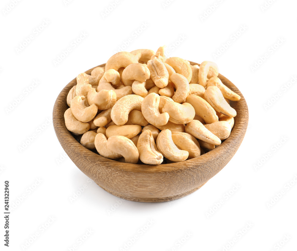 Tasty cashew nuts in bowl isolated on white