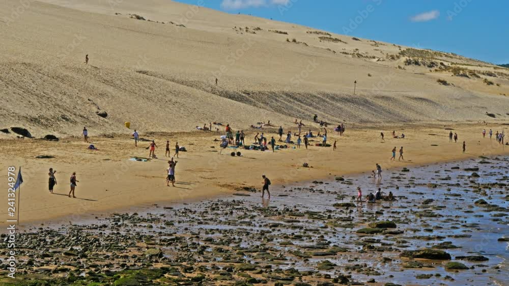 Dune du Pilat, Gironde,Nouvelle Aquitaine, France. The beach at bottom of the dune. Dune du Pilat, Gironde,Nouvelle Aquitaine, France. The beach at bottom of the dune.