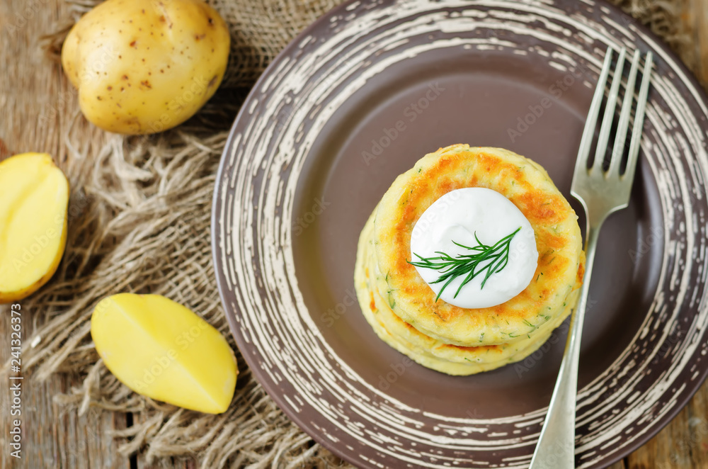 Cheese mashed potato cakes with sour cream and fresh dill Cheese mashed potato cakes with sour cream and fresh dill