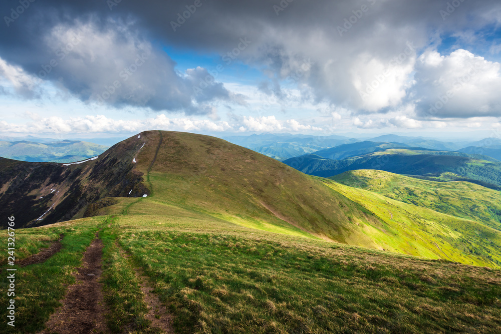 View of the stony hills glowing by evening sunlight. Dramatic spring scene. Landscape photography View of the stony hills glowing by evening sunlight. Dramatic spring scene. Landscape photography