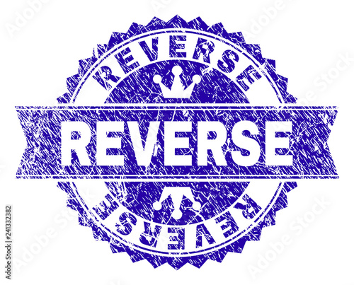 REVERSE rosette seal overlay with distress texture. Designed with round rosette, ribbon and small crowns. Blue vector rubber watermark of REVERSE title with scratched texture.