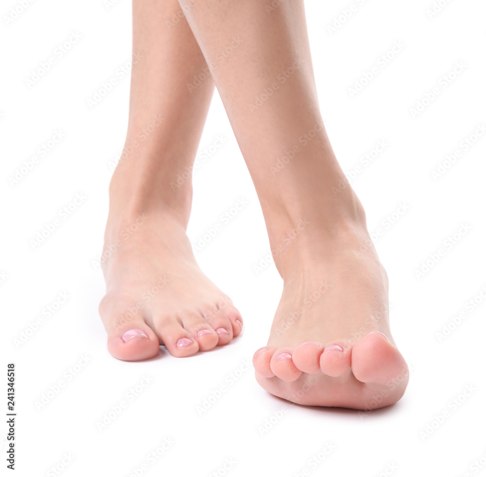 Woman with smooth feet on white background, closeup. Spa treatment Woman with smooth feet on white background, closeup. Spa treatment