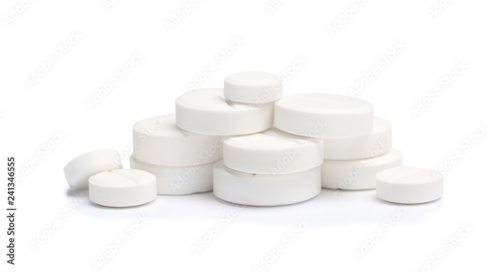 Pile of pills on white background. Medical treatment Pile of pills on white background. Medical treatment