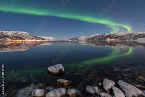 Northern lights reflected in fjord, island of Senja, Troms, Norway, Europe