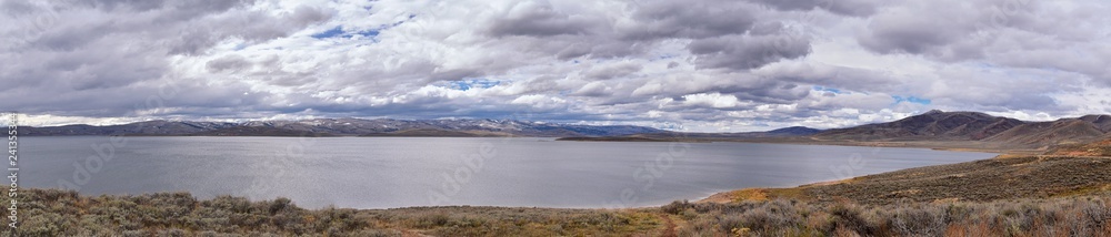 Strawberry Reservoir Bay in Fall, panorama forest views along Highway 40 near Daniels Summit between Heber and Duchesne in the Uinta Basin, Utah, USA. Strawberry Reservoir Bay in Fall, panorama forest views along Highway 40 near Daniels Summit between Heber and Duchesne in the Uinta Basin, Utah, USA.