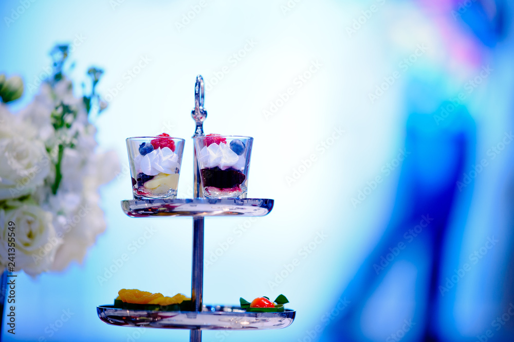 Glass shots pastry, wedding catering food, mini canapes food, tasty dessert, Beautiful decorate catering banquet table, snacks and appetizers, wedding celebration Glass shots pastry, wedding catering food, mini canapes food, tasty dessert, Beautiful decorate catering banquet table, snacks and appetizers, wedding celebration