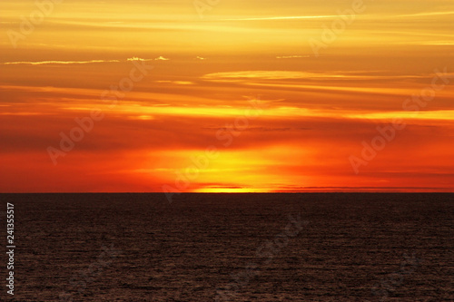 Red sunset on the beach