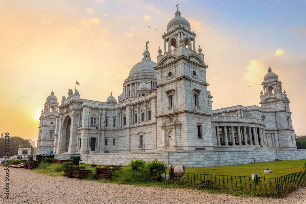 Historic Victoria Memorial Kolkata exterior architecture structure at sunrise.