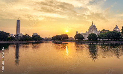 Victoria Memorial colonial architecture structure with lake at sunrise at Kolkata India.