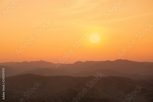 Sunset or sunrise with mountain