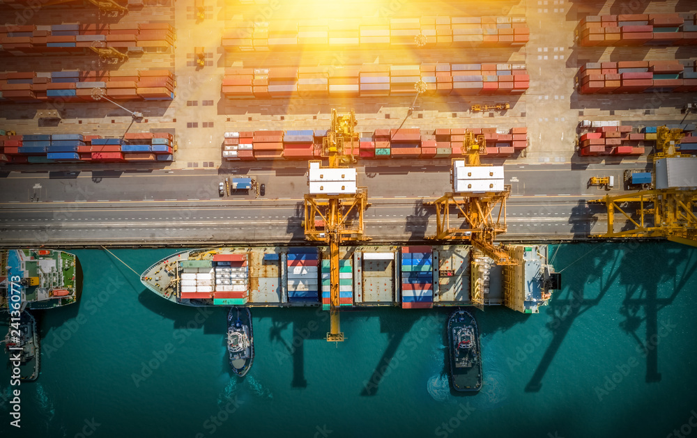 Logistics and transportation of Container Cargo ship and Cargo plane with working crane bridge in shipyard at sunrise, logistic import export and transport industry background