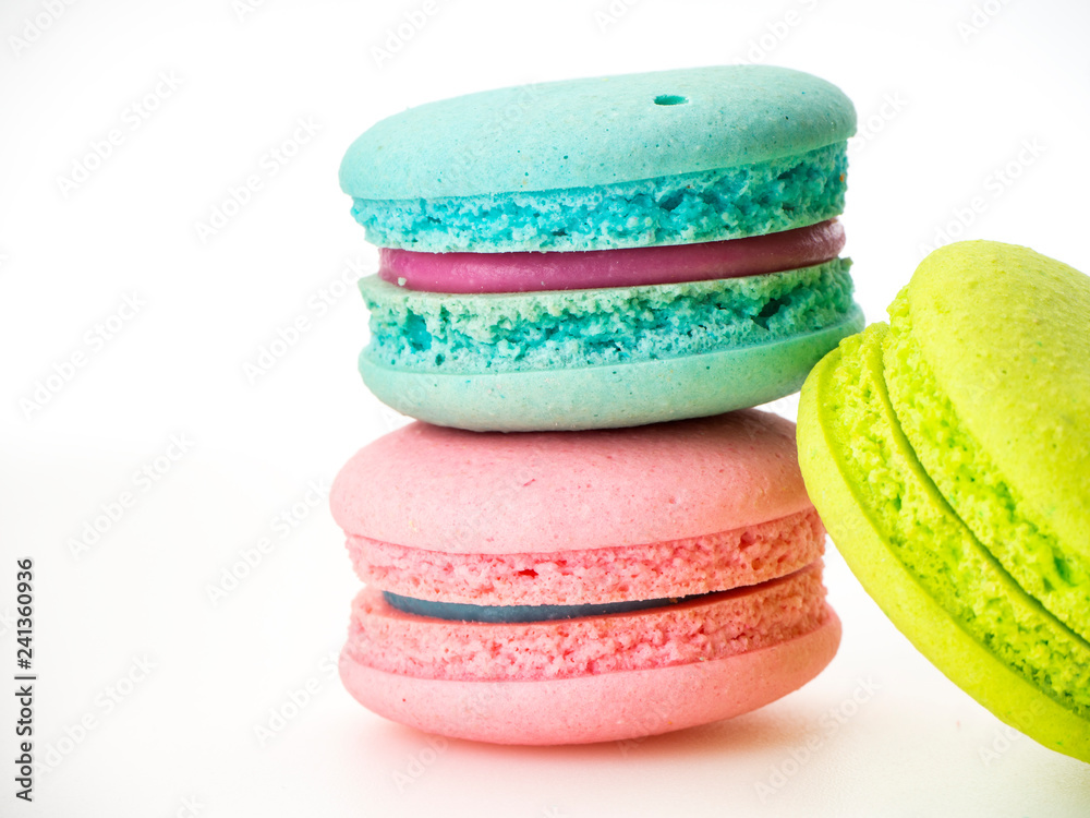 Fototapeta premium Sweet three macarons love on white