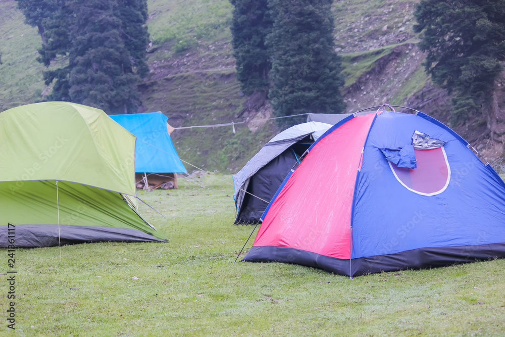 Tents erected at camping site in a hiking destination in Kashmir