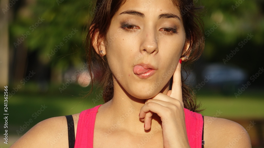 Hispanic Adult Female Making Funny Faces Hispanic Adult Female Making Funny Faces