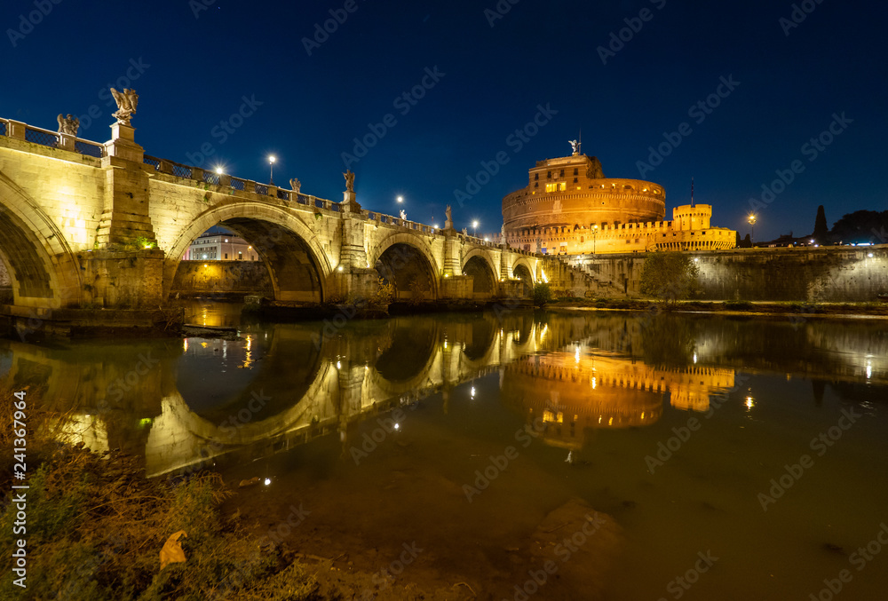 Rome (Italy) - The Tiber river and the monumental Lungotevere at sunset. Here in particular the Castel Sant'Angelo monument