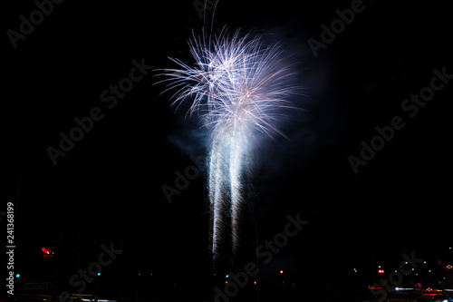 A fireworks display against the night sky