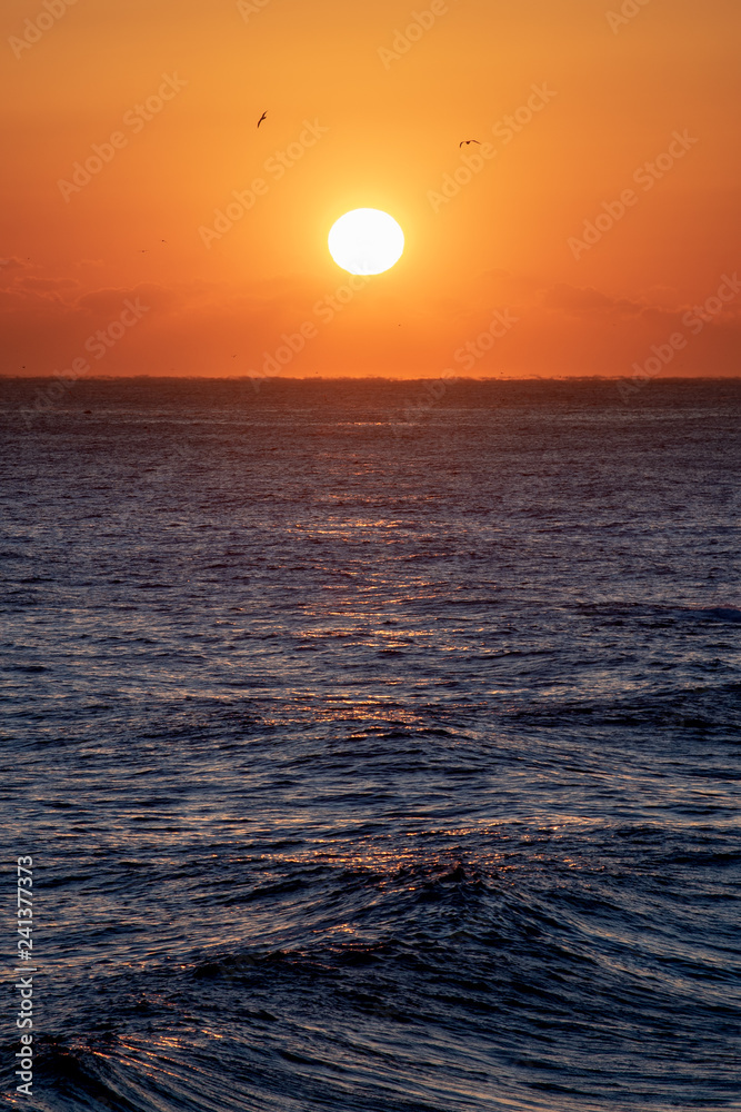 Beautiful sunrise over the ocean. South Korea at the sunrise of the East Sea sea. Beautiful sunrise over the ocean. South Korea at the sunrise of the East Sea sea.