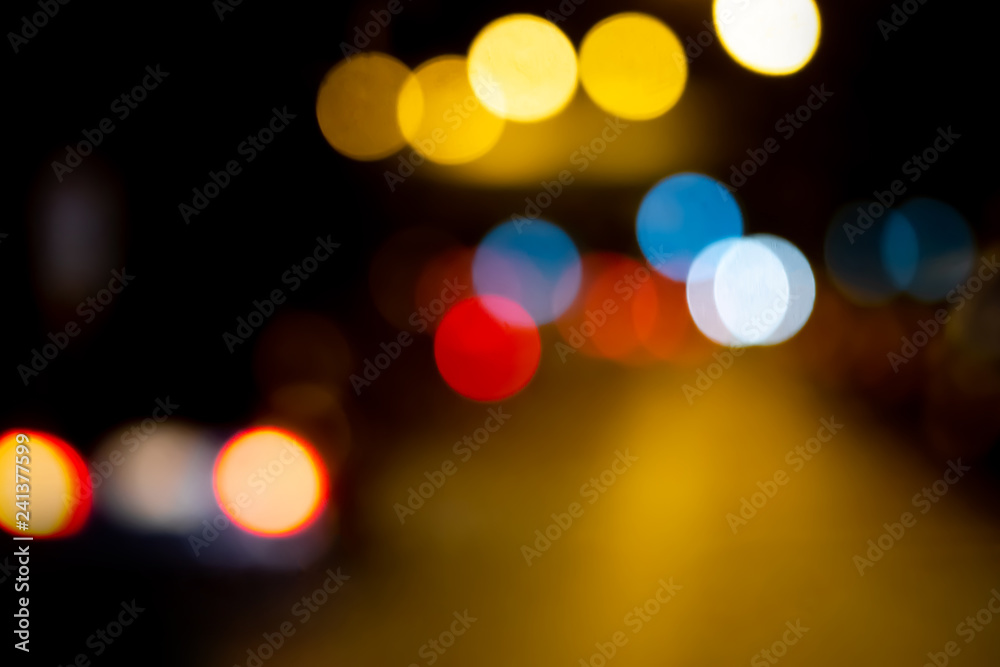 Bokeh night light at city for background. Beautiful circle glitter merry christmas and happy new year.